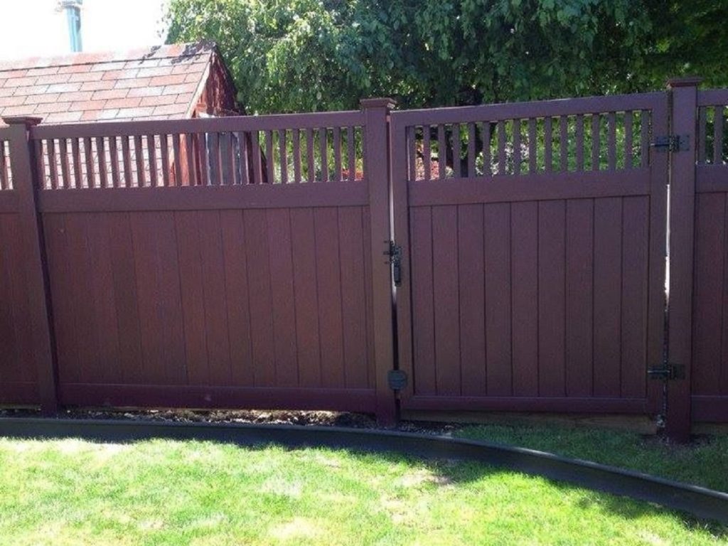 Maroon vinyl privacy fence